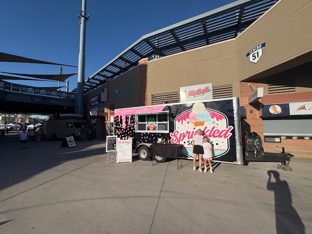 Trailer parked outside a stadium
